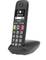 Un telefono cordless con tasti grandi e un display che mostra il nome 'Emma Martin'. L'apparecchio è posizionato su una base di ricarica.