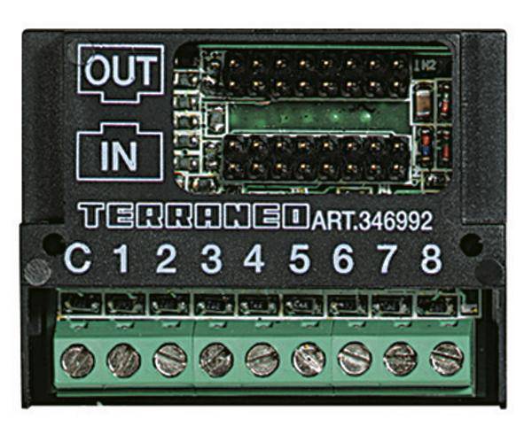 Componente elettronica nera con scritta 'TERRANEO ART. 346992'. Marcature 'IN' e 'OUT', connettori numerati da 1 a 8.