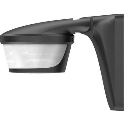 Proiettore da parete nero con un'ampia area luminosa bianca, montato lateralmente su un muro. Ideale per l'illuminazione esterna.