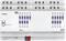 Immagine di un modulo dimmer KNX di Theben con 8 canali, dotato di pulsanti blu per il comando manuale e morsetti di connessione nella parte superiore.