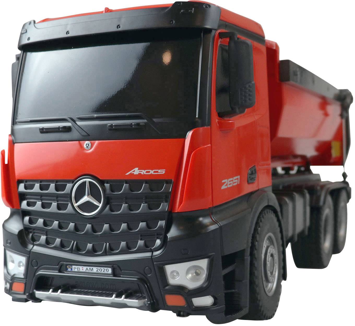 Camion giocattolo Mercedes-Benz Arocs ribaltabile rosso con vista frontale dettagliata.