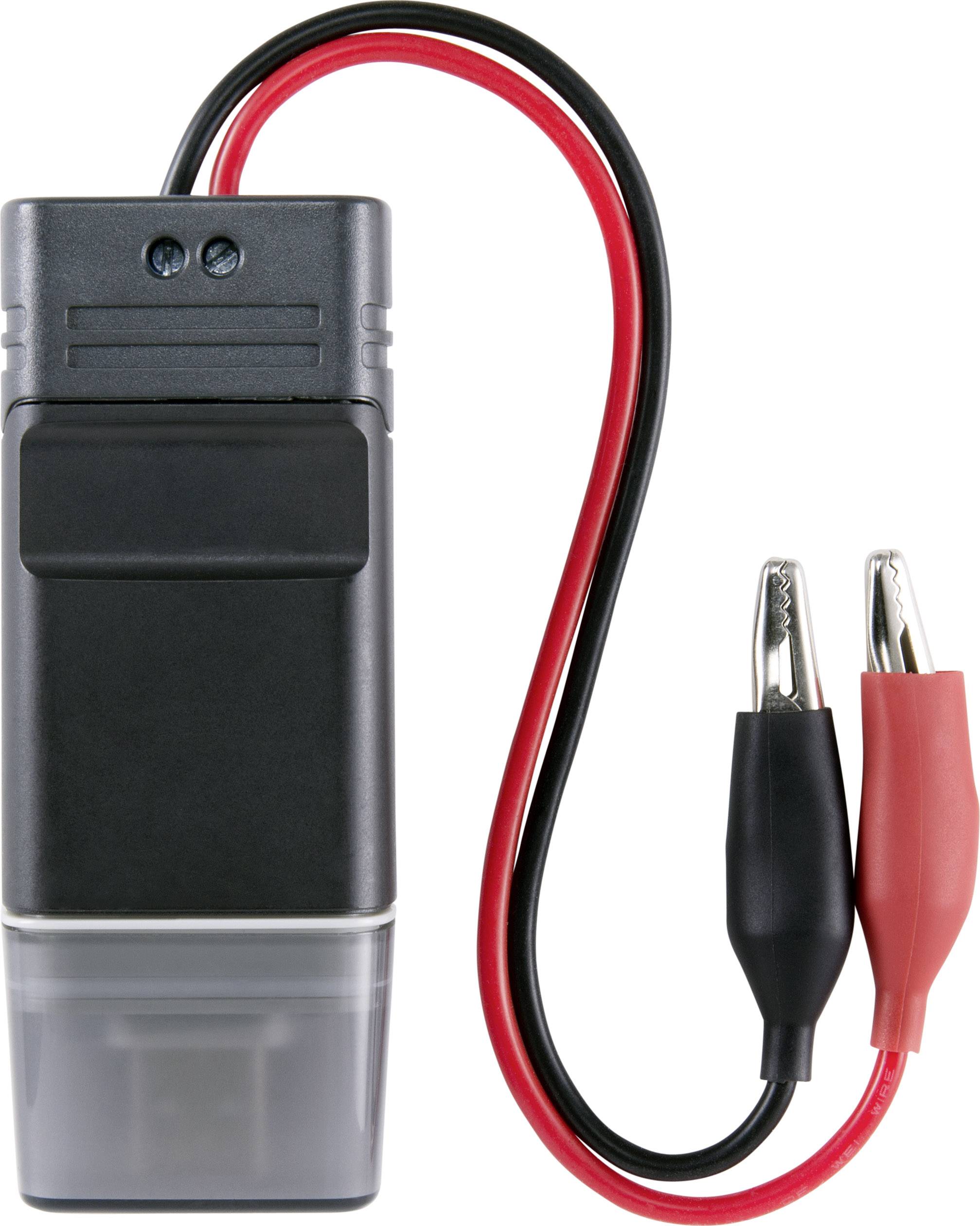 Dispositivo alimentato a batteria, con involucro nero e cavo rosso e nero dotato di morsetti a coccodrillo. Utilizzato per test di tensione.