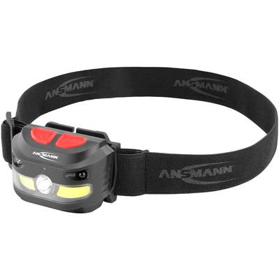 Lampada frontale nera con fascia elastica, due tasti rossi e luci LED, adatta per attività all'aperto al buio.