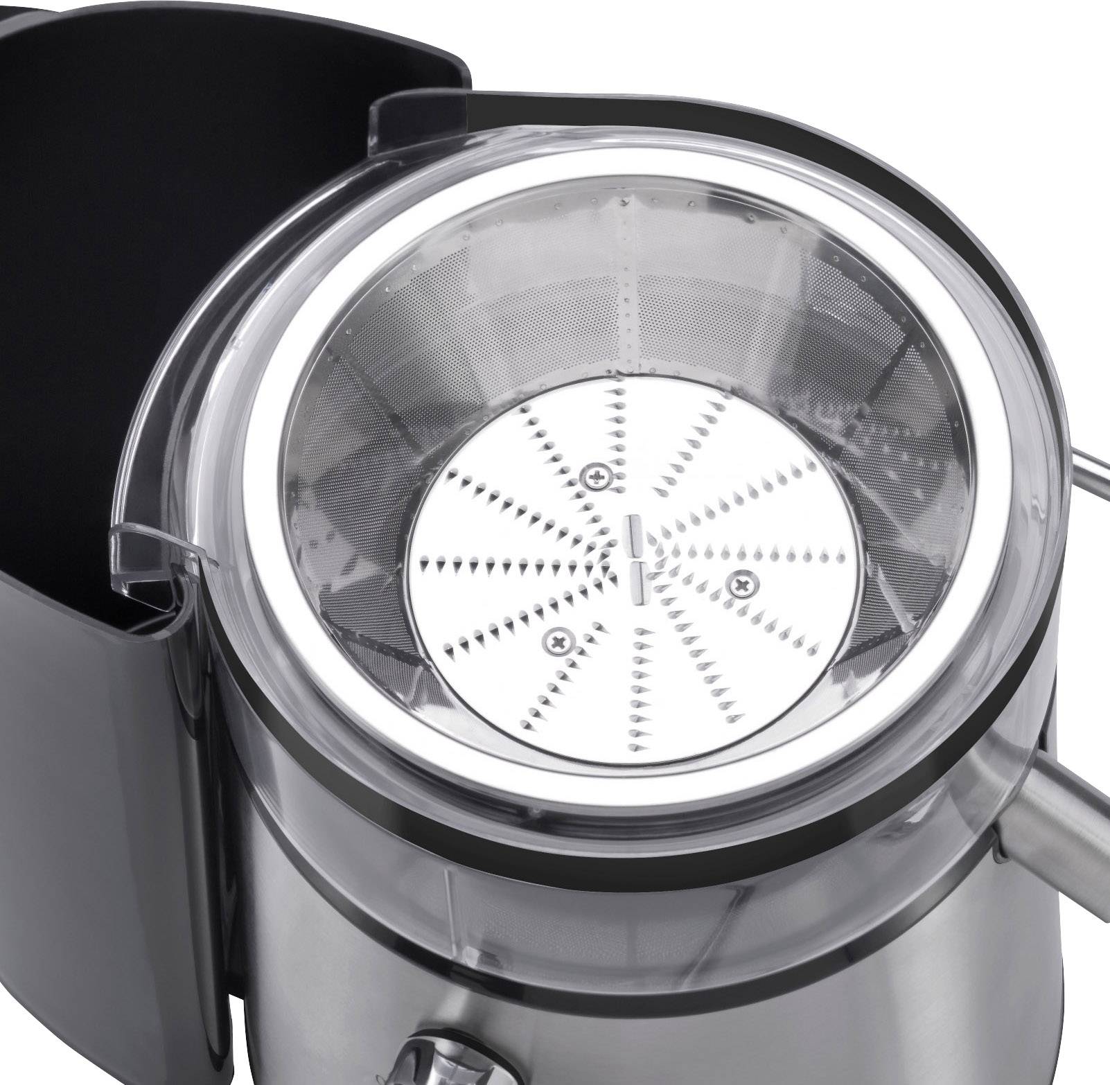 Un estrattore elettrico con un setaccio in acciaio inossidabile e un coperchio trasparente, pronto per preparare succo.