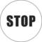 Un cartello rotondo con la parola 'STOP' stampata in grandi lettere nere.