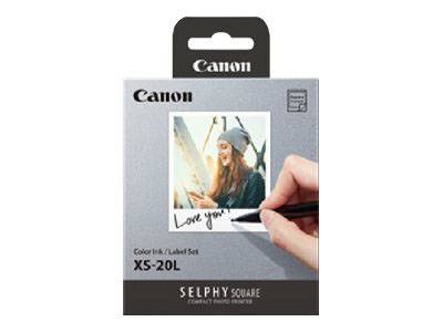 Confezione di cartucce Canon con foto di una donna. Una mano scrive 'Love you!' sull'immagine. Modello XS-20L.