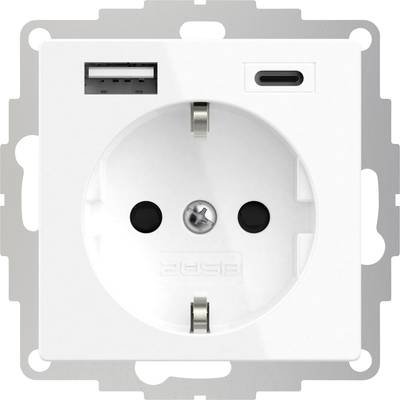 Presa elettrica con porte USB-A e USB-C, integrata in una placca bianca a muro.