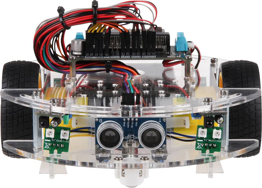Un robot trasparente su ruote con cavi rossi e neri, sensori anteriori e una scheda elettronica in alto.