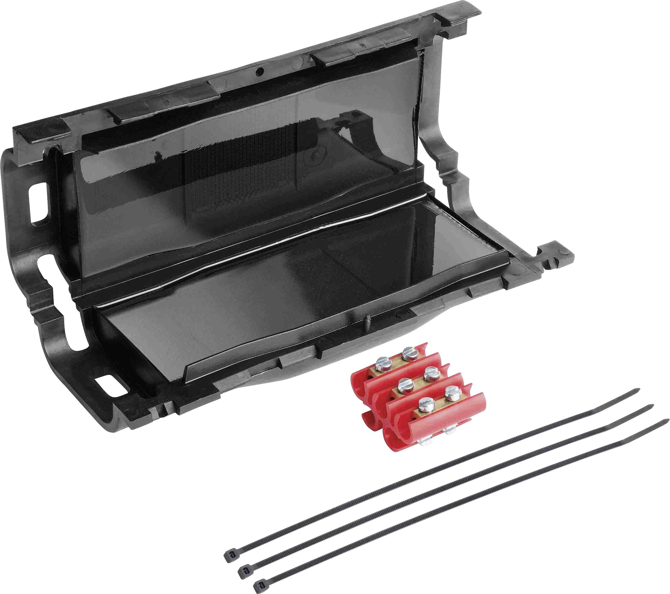 Un involucro nero in plastica con fissaggi per cavi per connessioni elettriche, inclusi due morsetti rossi e tre fascette fermacavo.