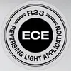 Logo 'R23 Reversing Light Application ECE', nero su sfondo grigio.