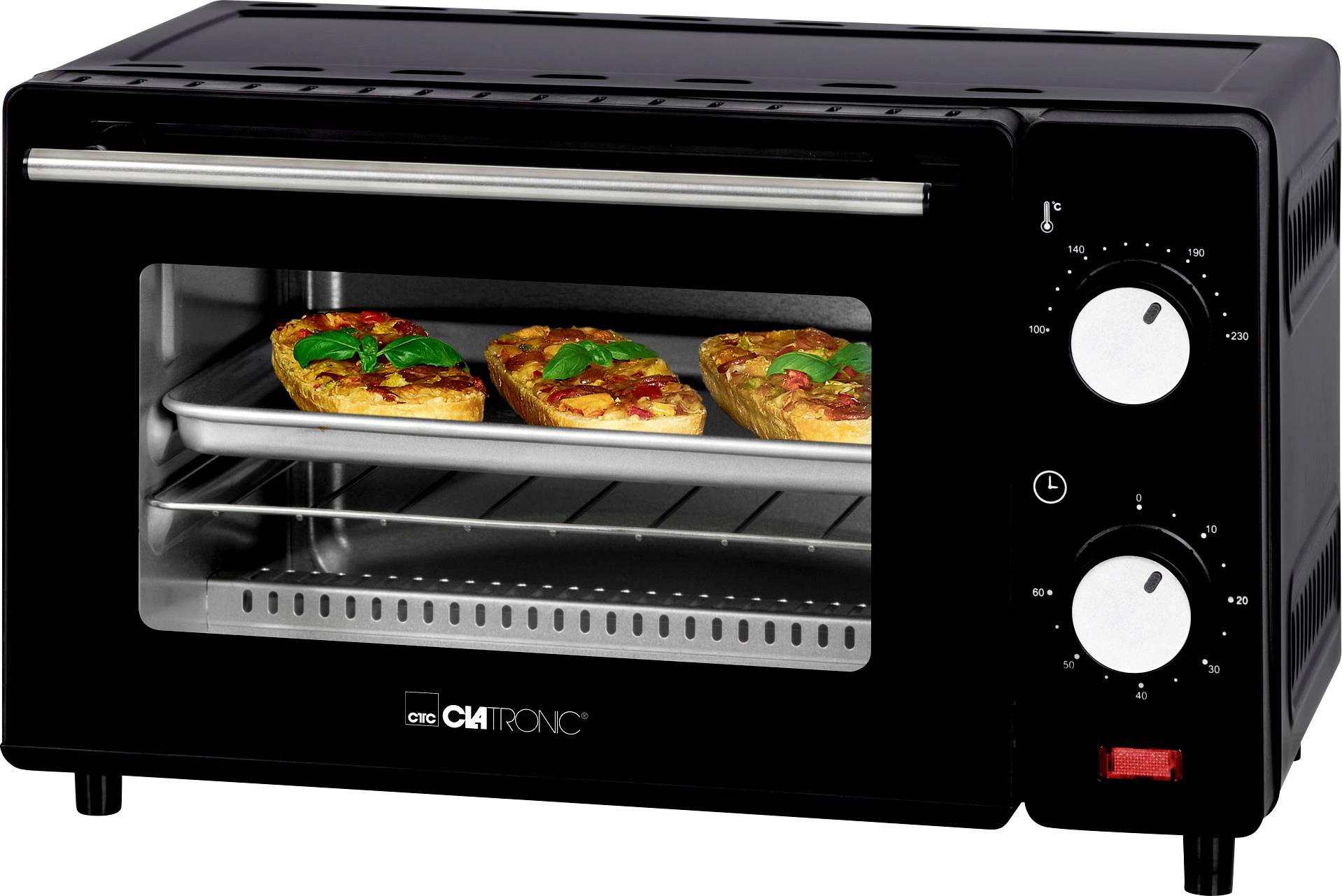 Forno compatto con due pietanze dorate e gratinate su una teglia. Impostazioni di temperatura e tempo visibili sul lato.