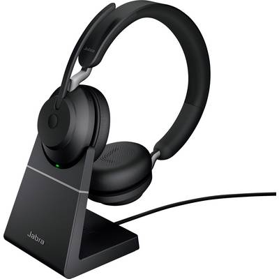 Cuffie Jabra nere poggiate su una base di ricarica, collegate con un cavo. Ideali per una comunicazione chiara in ufficio o in smart working.