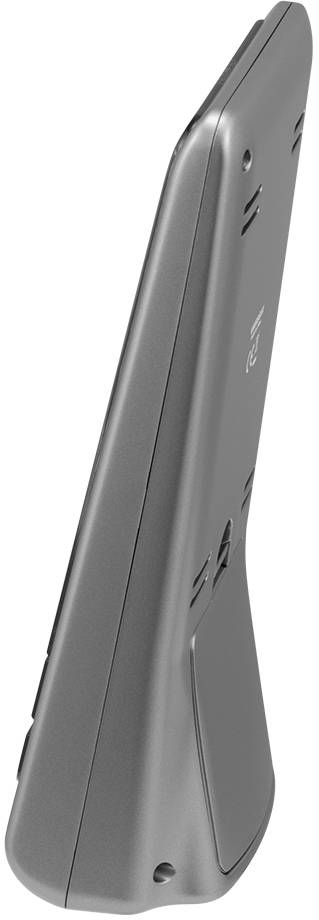 Un dispositivo elettrico grigio in vista laterale con design inclinato e fessure di ventilazione; la sua funzione specifica non è riconoscibile.