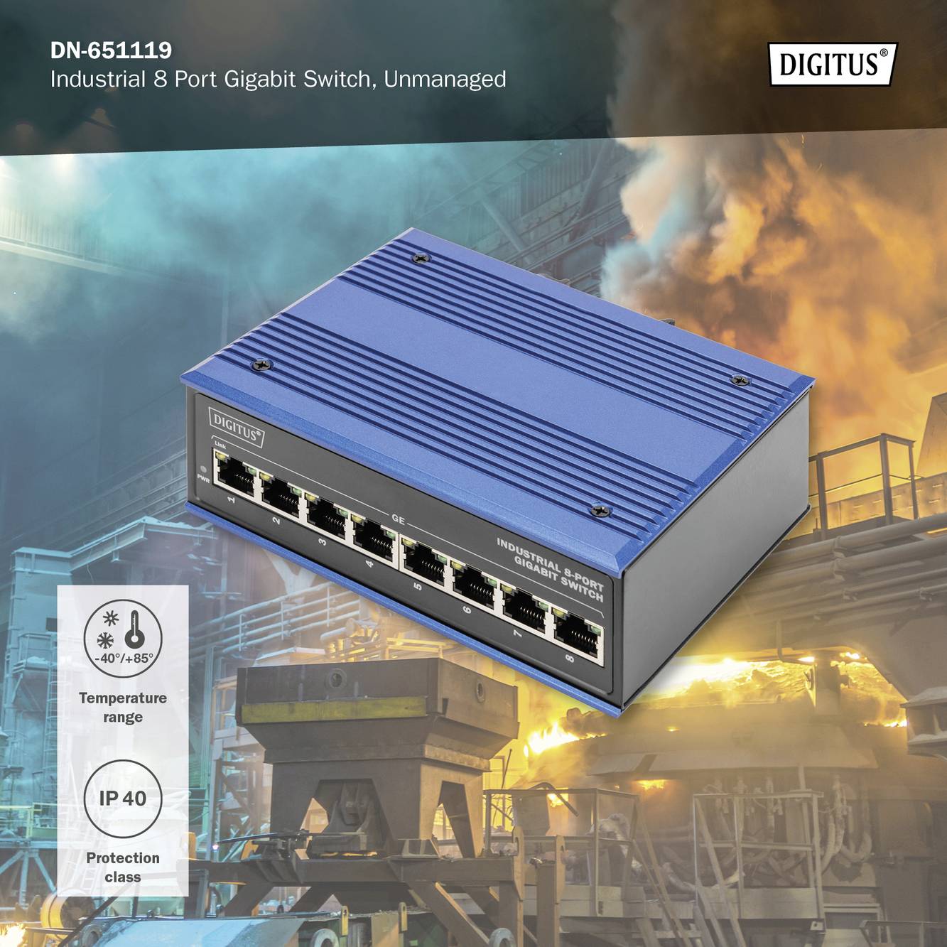 Switch Gigabit industriale a 8 porte, non gestito, di Digitus. Robusto involucro blu, adatto a temperature da -40°C a +85°C, grado di protezione IP40. Sullo sfondo si vede un ambiente industriale con fumo.