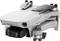 Drone compatta grigia con fotocamera 4K, ripiegata e pronta al decollo, con scritta del modello 'Mini 2' visibile.