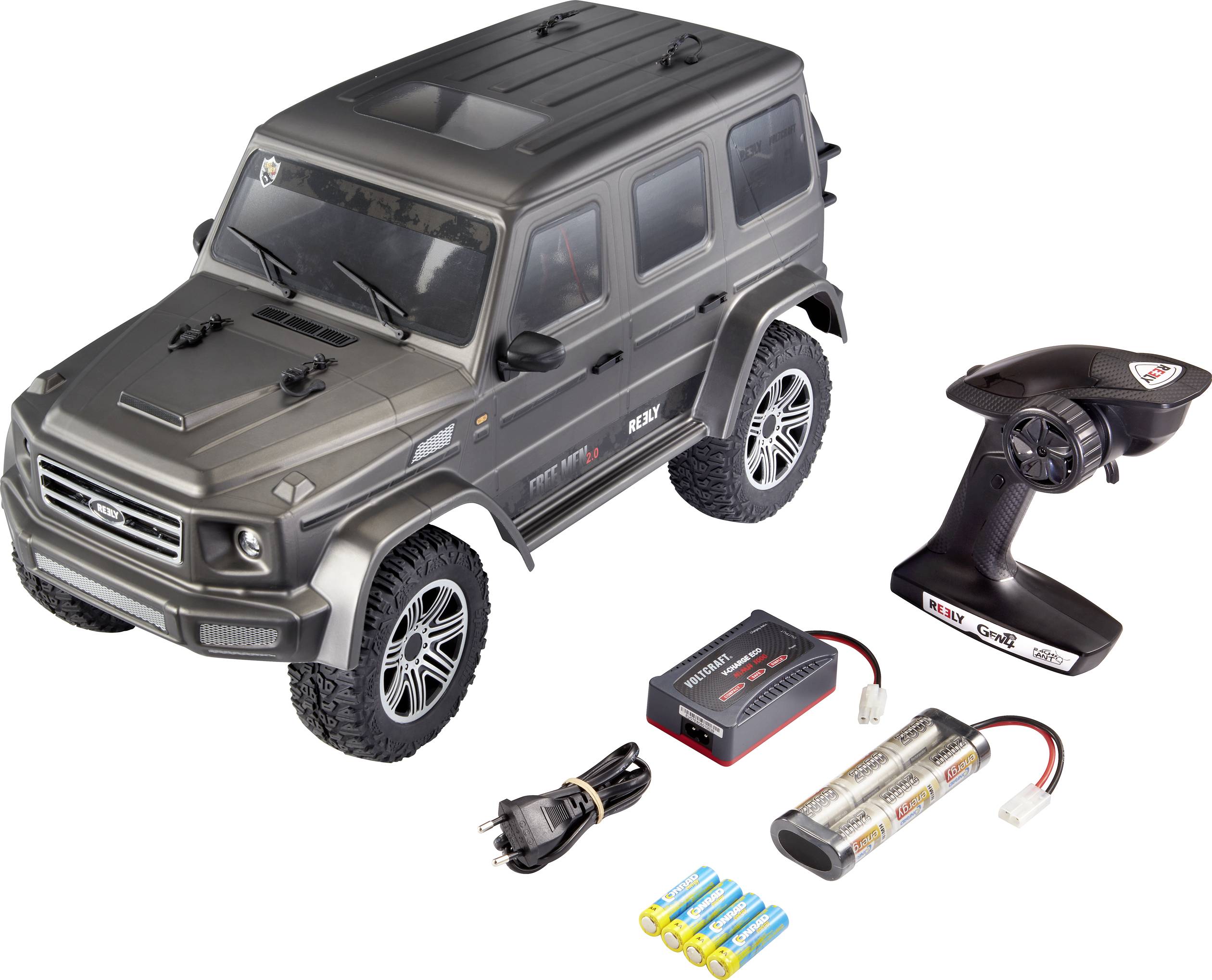 Modello di fuoristrada radiocomandato in grigio con telecomando, caricabatterie e batterie. Ideale per hobby o modellismo.