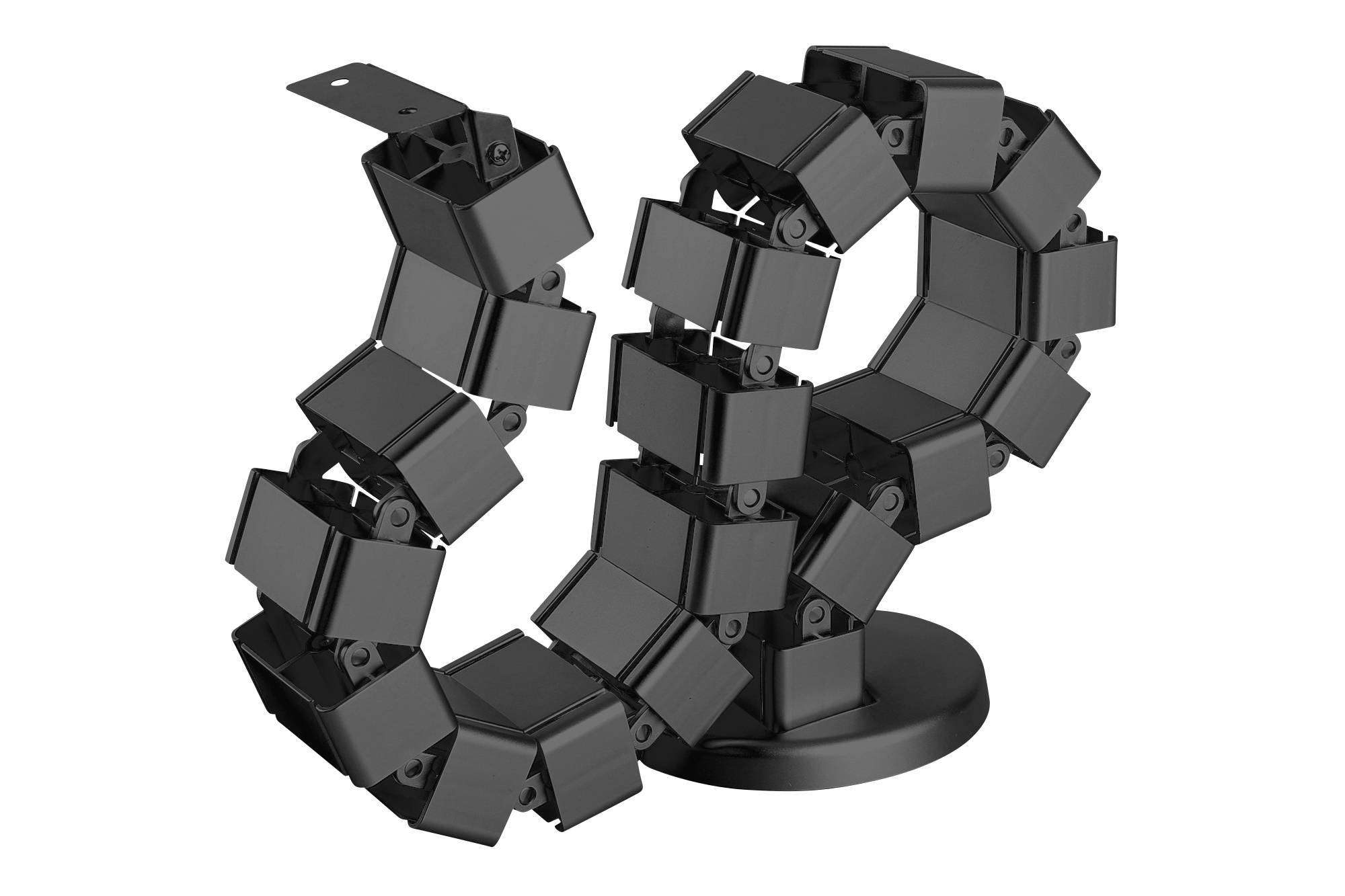 Un canale per cavi flessibile in nero, arrotolato a spirale, sostenuto da una base circolare.