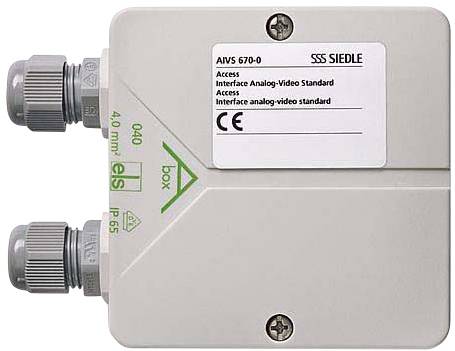 Interfaccia 'AVVS 670-0' su dispositivo rettangolare. Scanalatura per connettori video analogici standard. Due cavi di connessione a sinistra. Certificato IP65.