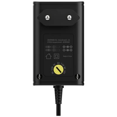 Alimentatore nero con tensione regolabile da 3V a 12V. Il nome del marchio e il luogo di produzione sono stampati.