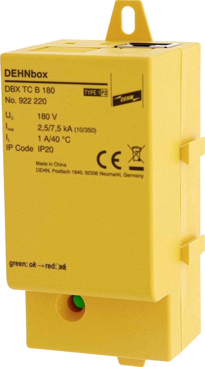 Involucro giallo di una scatola di protezione, contrassegnata come DEHNbox DBX TC B 180, con indicazioni di volt e ampere, marchio CE e indicatore verde.
