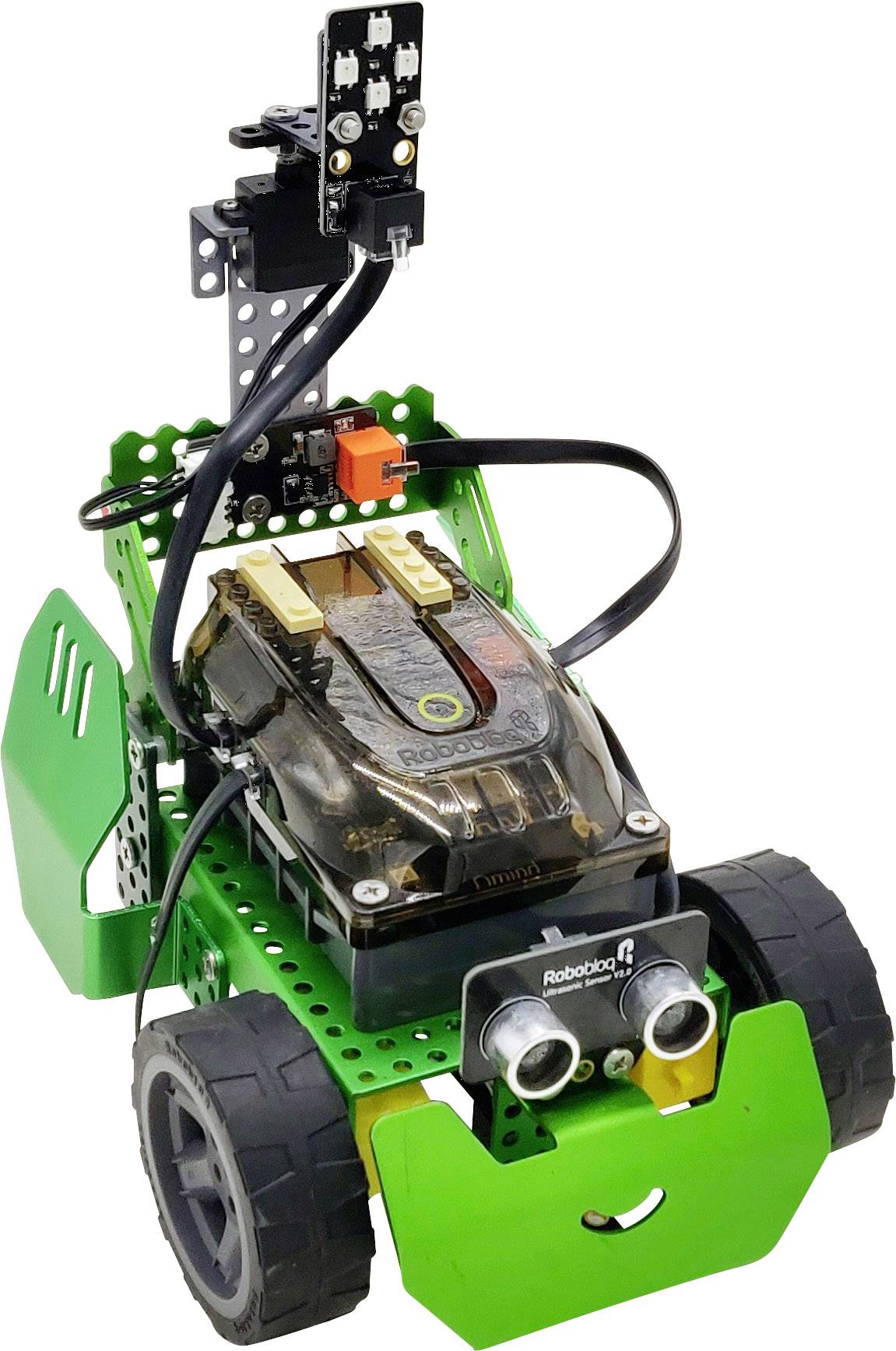 Un robot giocattolo verde con ruote, sensori e una telecamera su un braccio. Il robot mostra un volto amichevole.