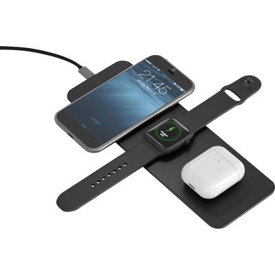 Smartphone, smartwatch e auricolari wireless su una stazione di ricarica wireless. Tutti i dispositivi vengono caricati contemporaneamente.