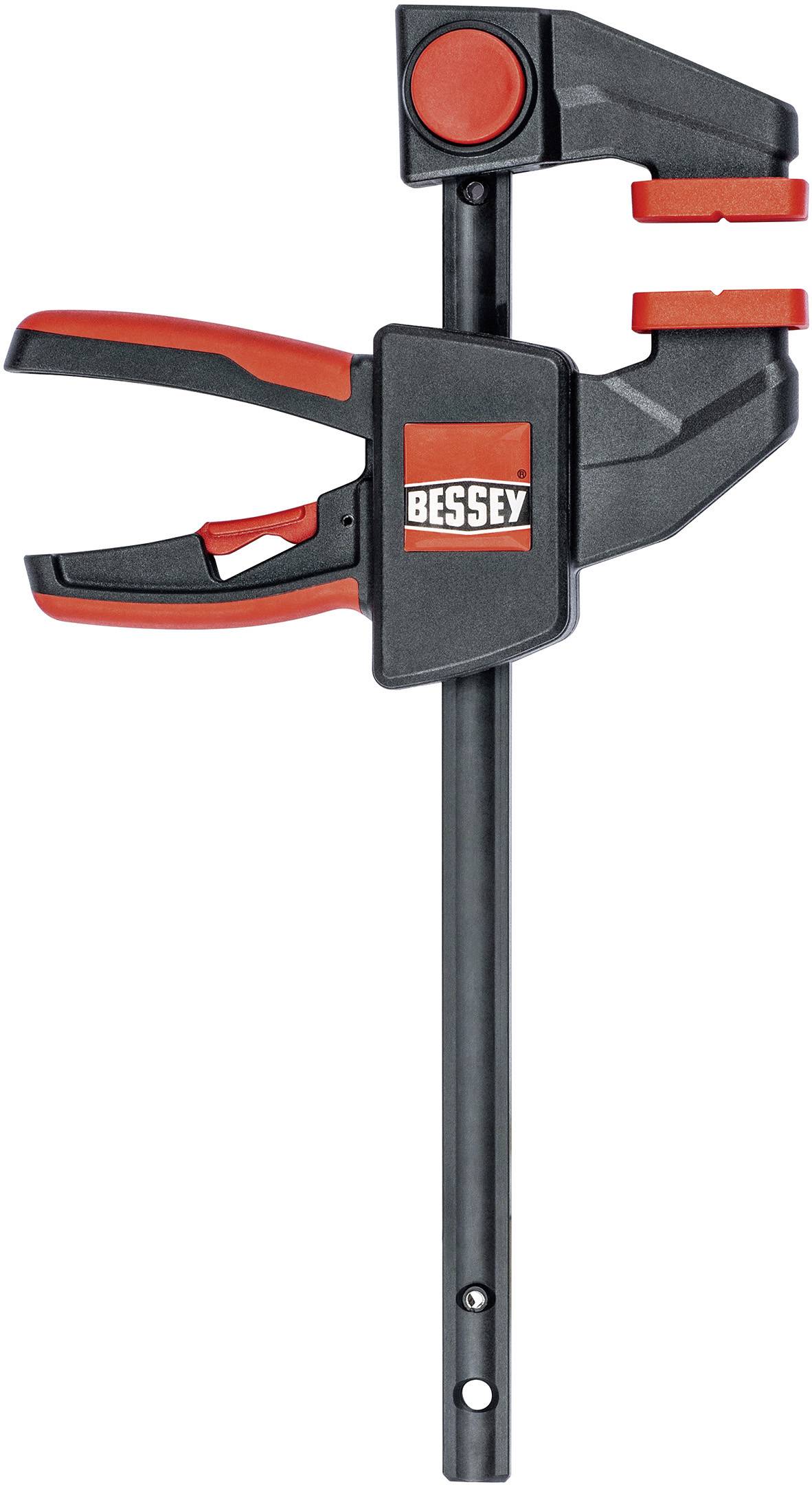 Una morsa a C di colore nero con impugnature rosse e il marchio 'BESSEY', utilizzata per bloccare materiali durante lavori in legno o progetti di costruzione.