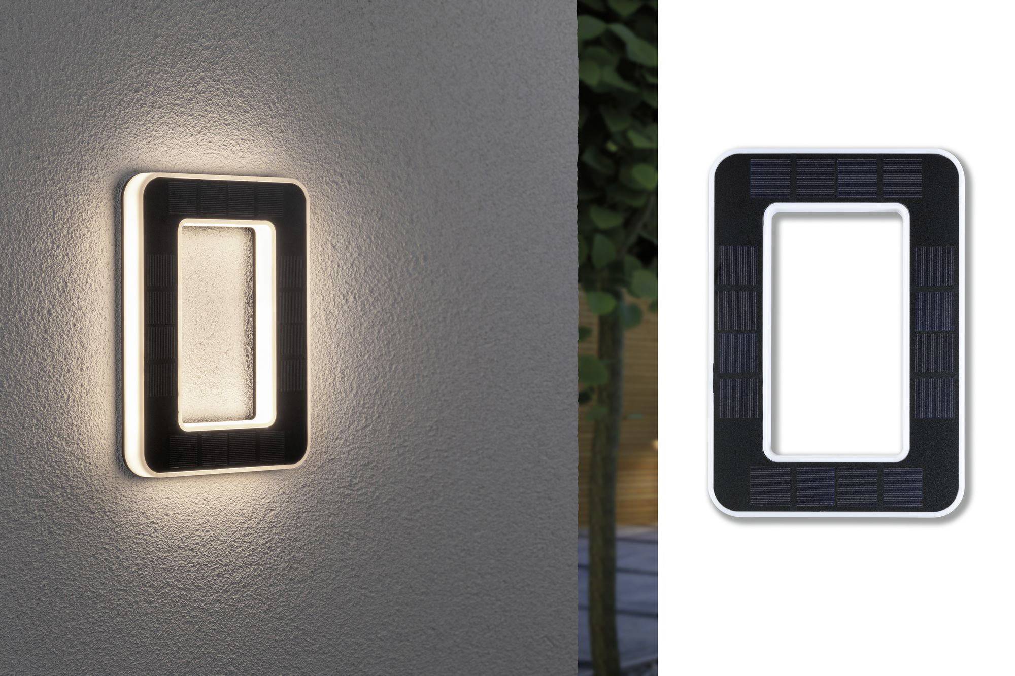 Lampada a muro alimentata a energia solare illuminata su una parete esterna. A destra della lampada è raffigurato il pannello solare.