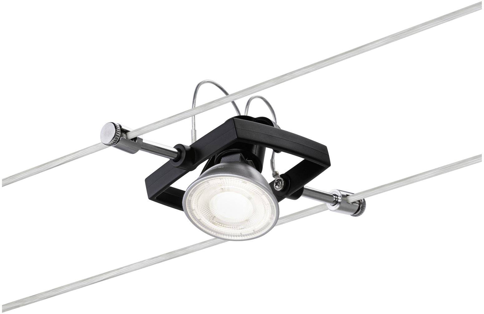 Faretti a soffitto montati su un sistema a cavi, design moderno, adatti per illuminazione direzionale in ambienti interni.