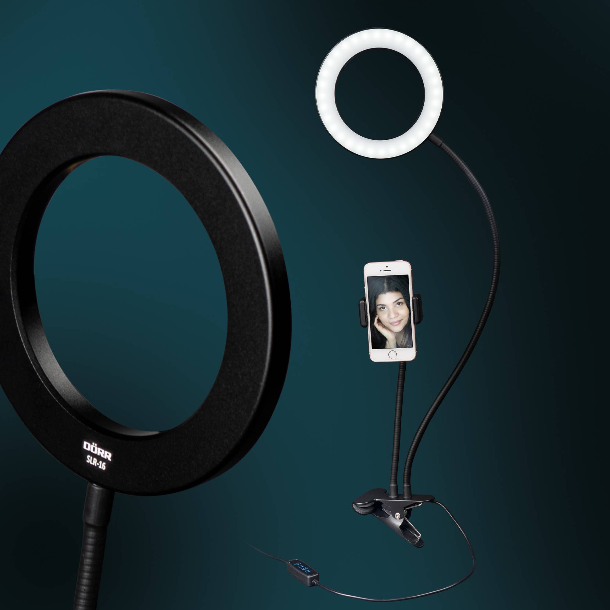 Due anelli luminosi di dimensioni diverse, uno nero e uno bianco, con supporto per smartphone; adatti per fotografia o riprese video.