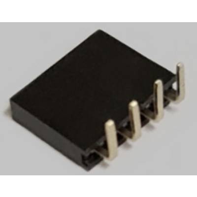 Un circuito integrato nero con quattro piedini metallici, poggiante su una superficie grigia.