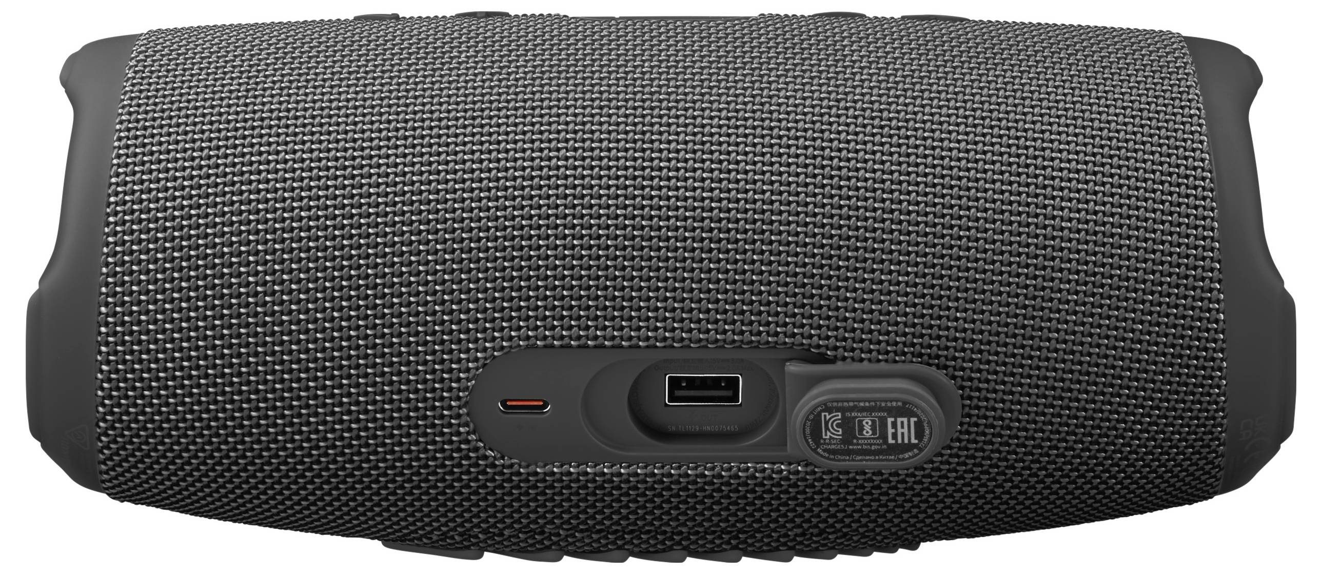 Altoparlante portatile nero con tasti del volume sulla parte superiore e porta USB sul lato, su sfondo grigio.