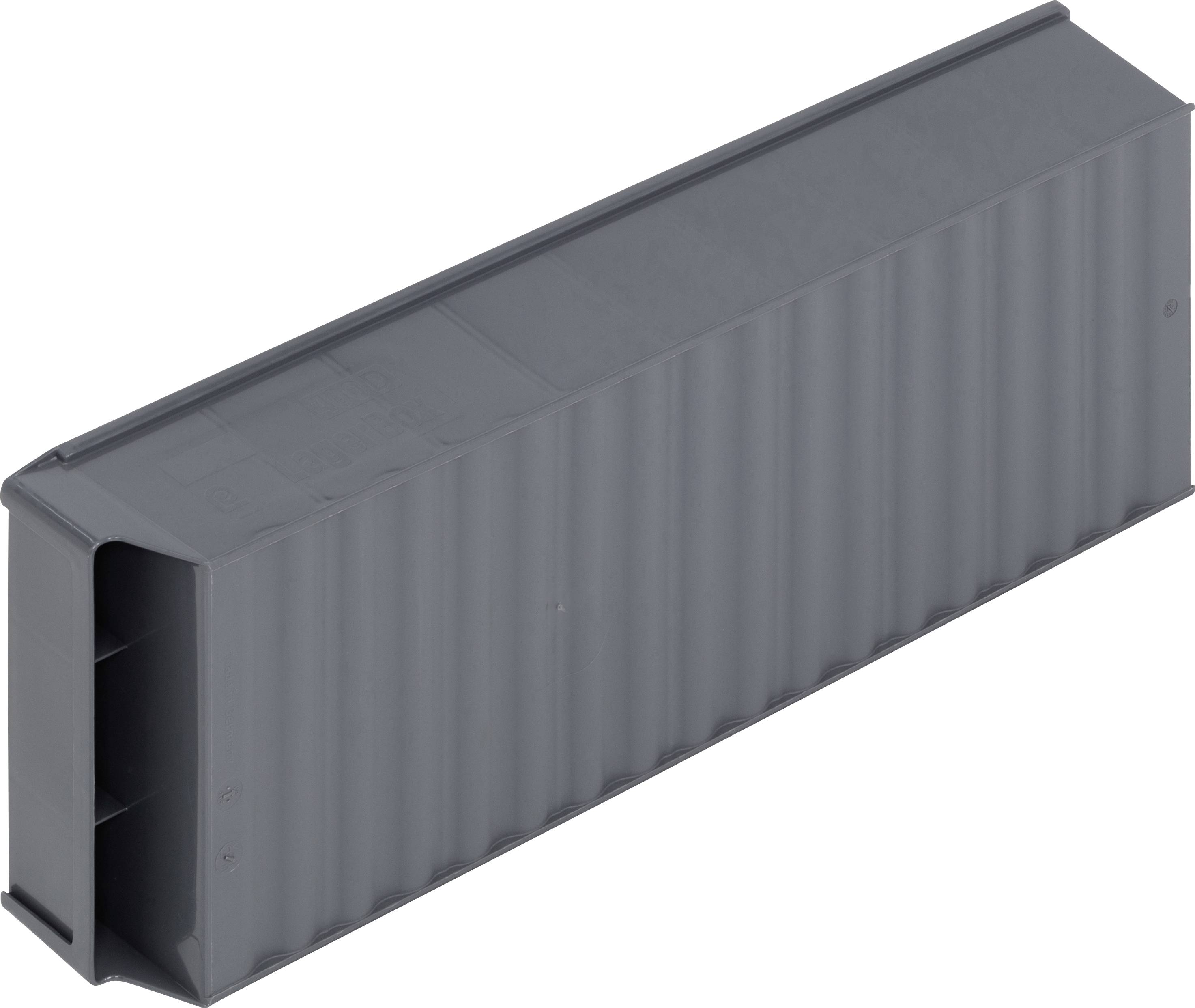 Contenitore grigio, rettangolare, con superficie ondulata, simile a un container navale, privo di scritte o simboli identificabili.