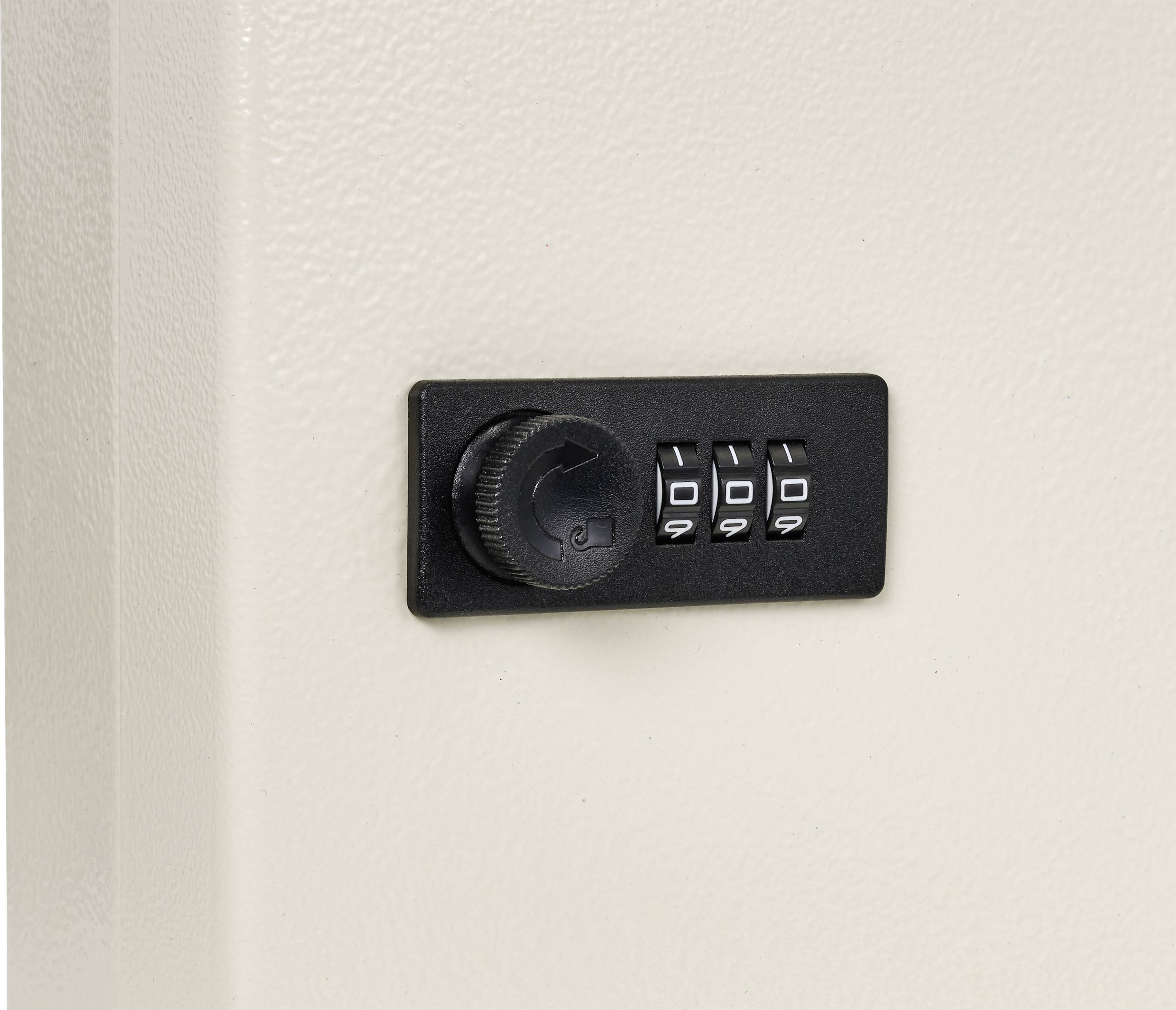 Una cassaforte con un lucchetto a combinazione, composta da quattro ruote dei numeri nere e una manopola di rotazione. Lo sfondo è chiaro.