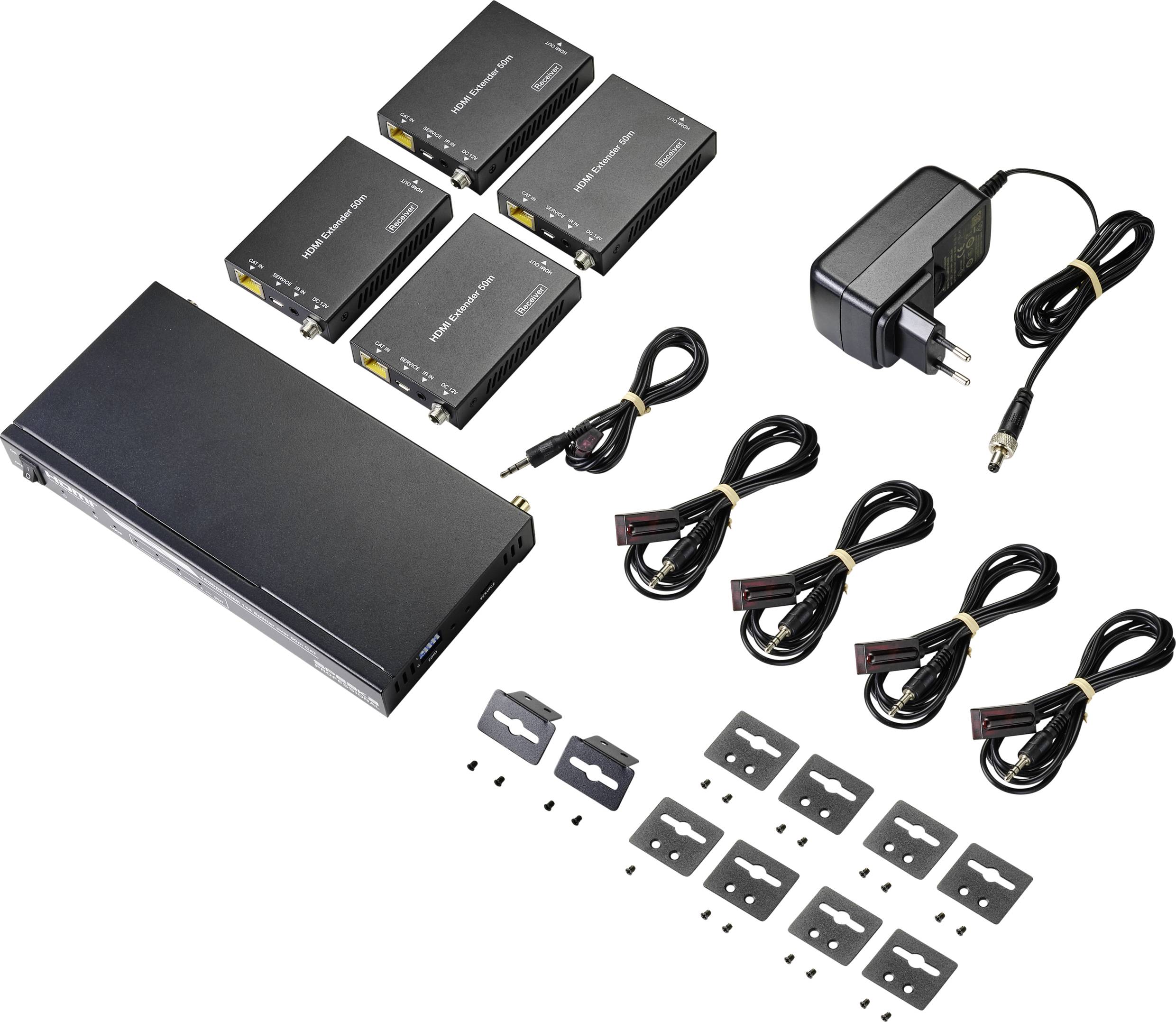 Kit di rete con quattro convertitori media Ethernet, alimentatore, cavi e materiale di montaggio.