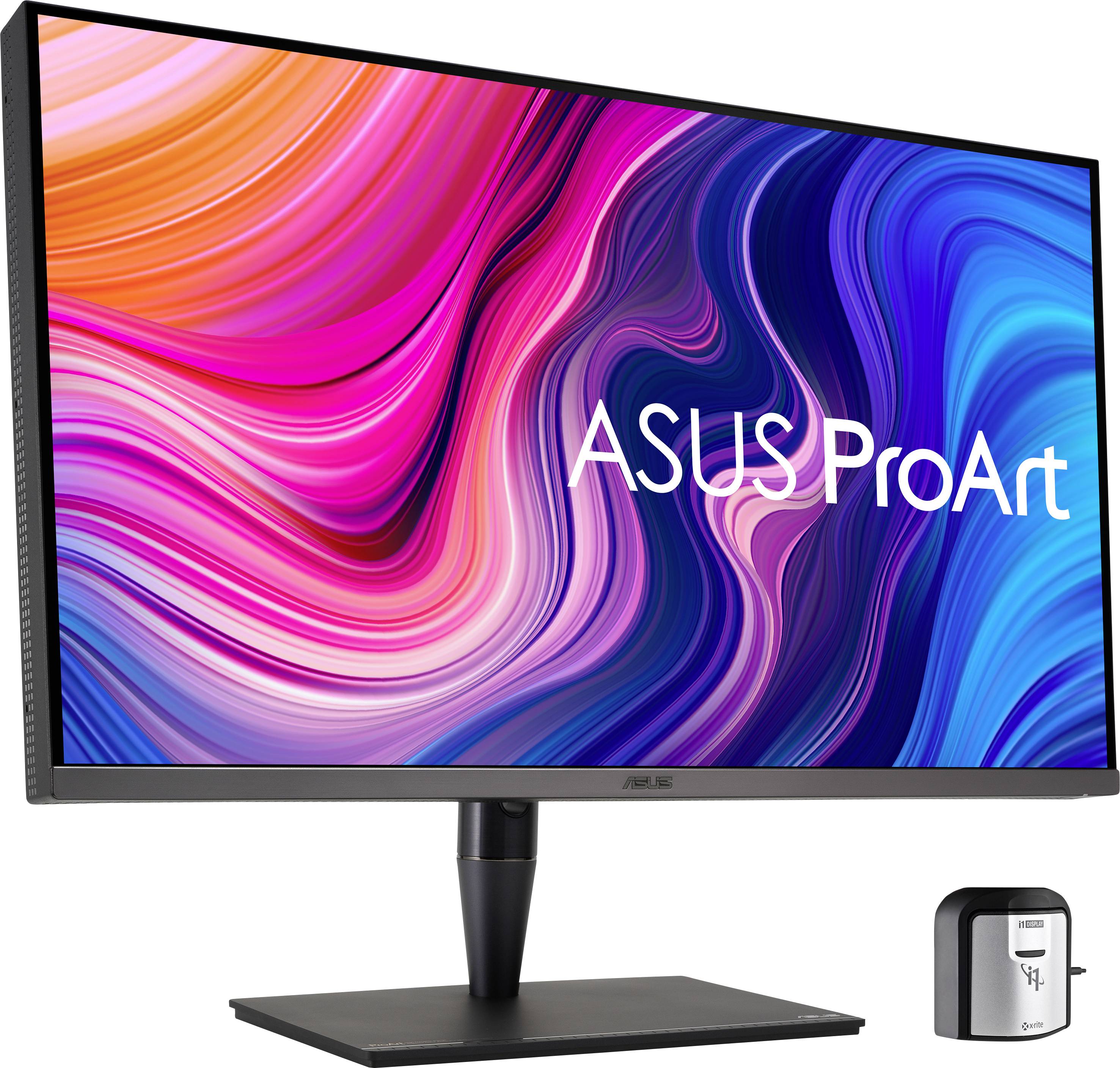 Un monitor ASUS ProArt con colori vivaci sullo schermo. Accanto, un piccolo dispositivo nero per la calibrazione.