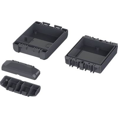 Quattro componenti del telaio in plastica grigio scuro, due più grandi a forma di scatola e due coperture più piccole, sono rappresentati separati gli uni dagli altri.