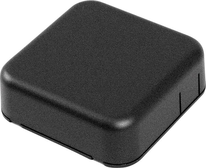 Un dispositivo nero, quadrato con angoli arrotondati, probabilmente un sensore elettronico o un trasmettitore.