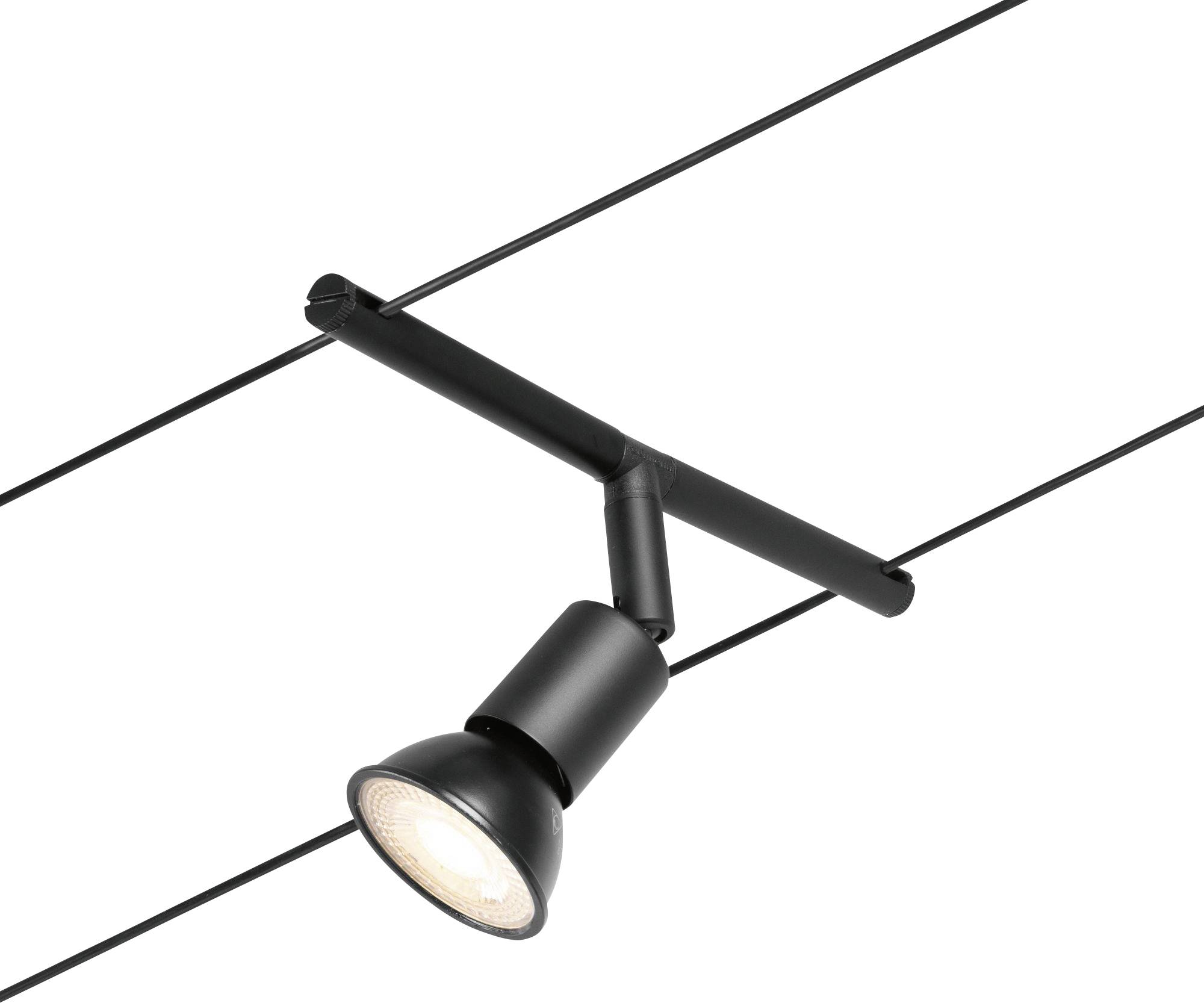 Una lampada nera su binario con un proiettore regolabile che dirige la luce verso un'area specifica. Ideale per un'illuminazione mirata.