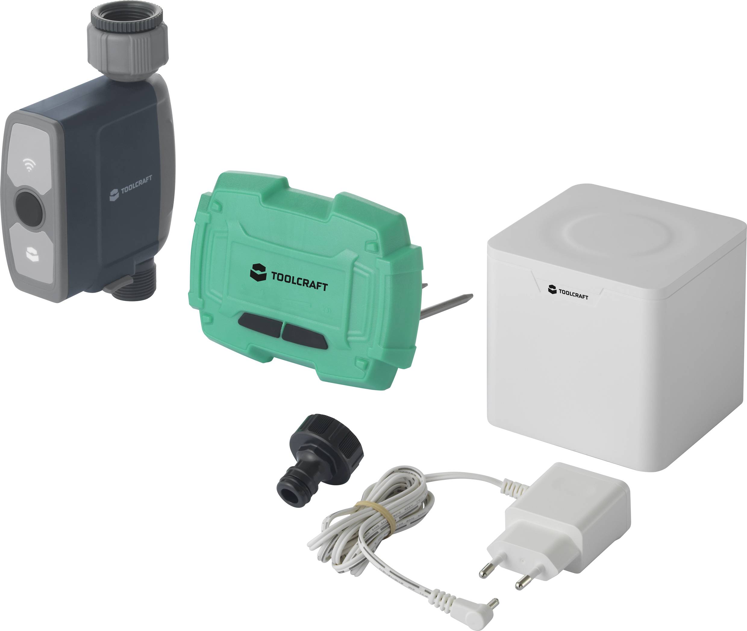 Un sistema di irrigazione con valvola, unità di controllo, alimentatore e adattatore. Marca TOOLCRAFT. Ideale per l'automazione del giardino.