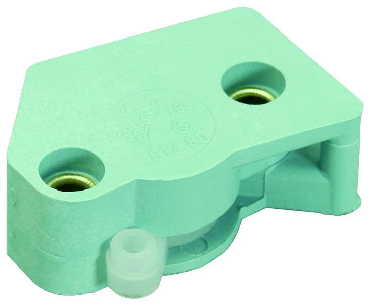 Un componente in plastica verde con due fori di fissaggio visibili e un piccolo perno sporgente sotto di essi.