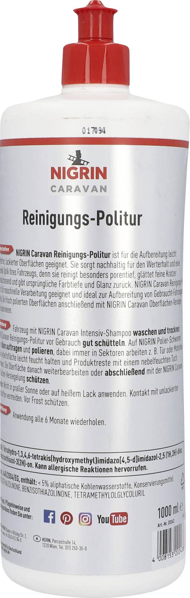 Flacone di 'Nigrin Caravan Detergente-Polish'. Il testo spiega l'applicazione per la pulizia e la manutenzione delle superfici dei camper. Coperchio rosso.