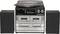 Impianto stereo con giradischi, radio e lettore di cassette, affiancato da due altoparlanti.