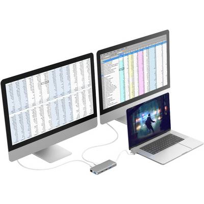 Tre schermi mostrano tabelle con colonne di dati; il laptop visualizza un'immagine. Un distributore collega tutti i dispositivi.
