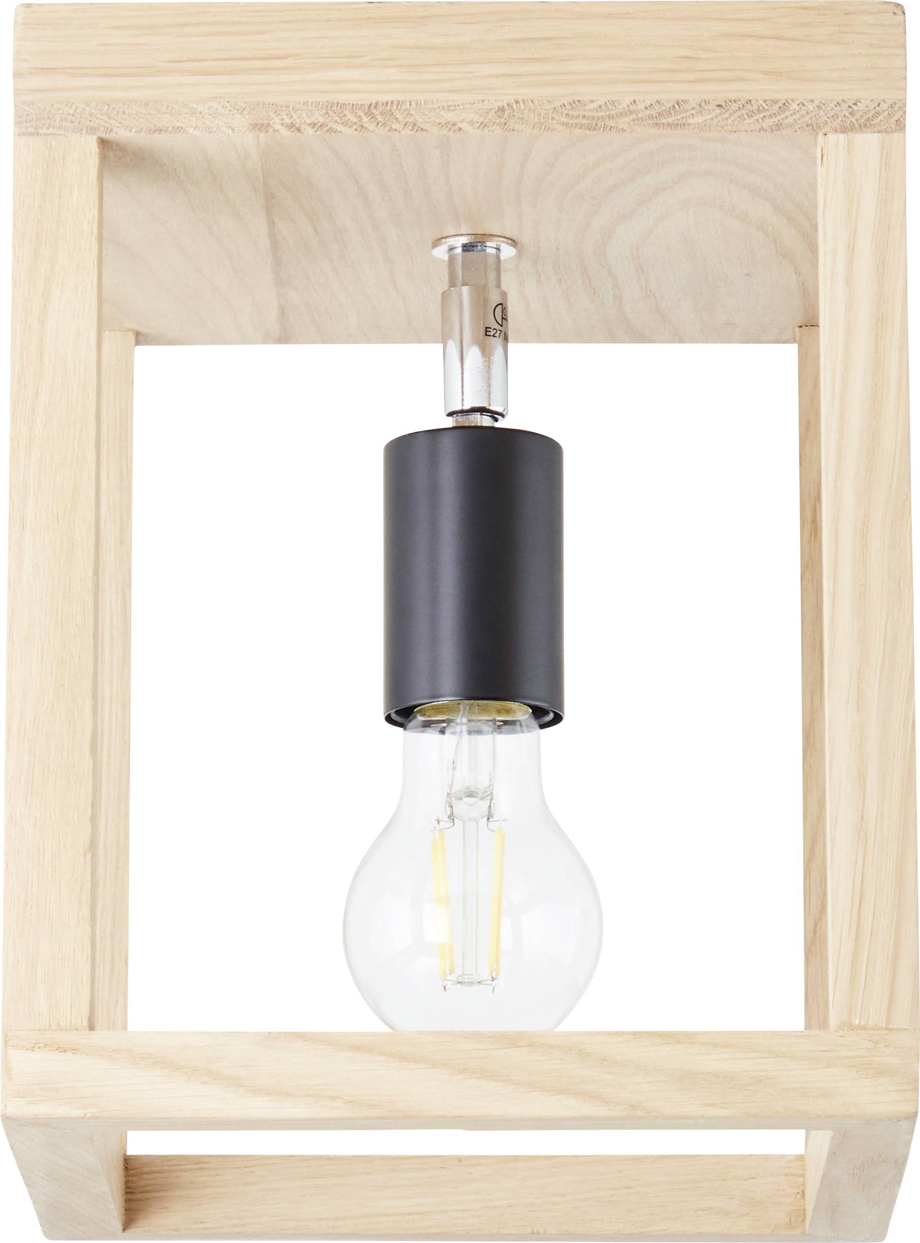 Una lampadina in una cornice quadrata moderna in legno con fissaggio nero. Design minimalista, lampada da soffitto.