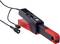 Pinza amperometrica rossa e nera con cavo e connettore. Strumento utilizzato per misurare correnti elettriche, comunemente impiegato nel campo dell'elettronica.