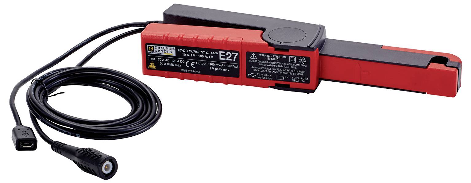 Questa immagine mostra un dispositivo elettrico portatile di misurazione con involucro rosso e un lungo cavo nero utilizzato per effettuare misurazioni.