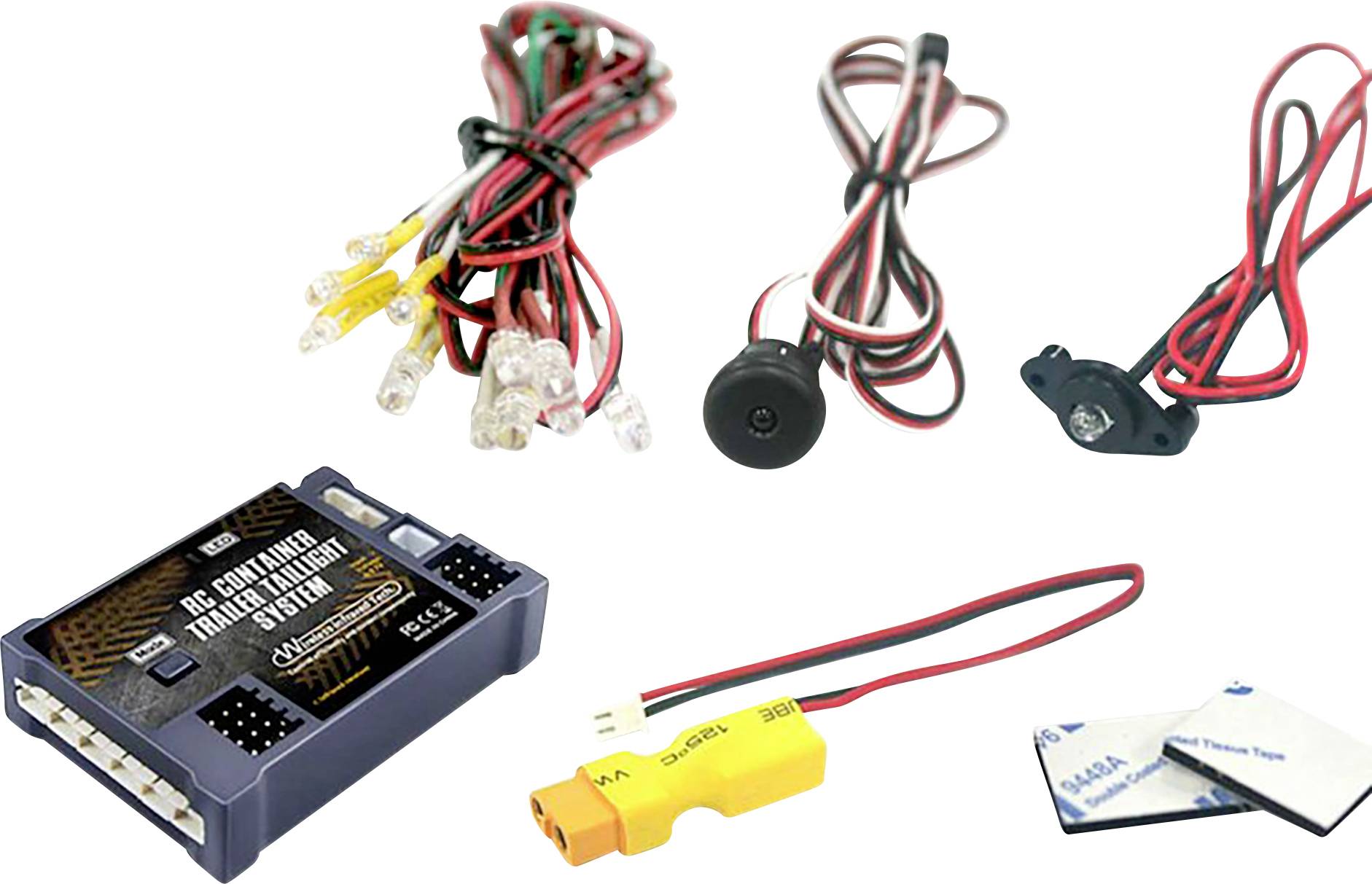 Un set elettronico con modulo di controllo, luci LED, cavi e pad adesivi. Pensato per l'installazione in progetti di modellismo.