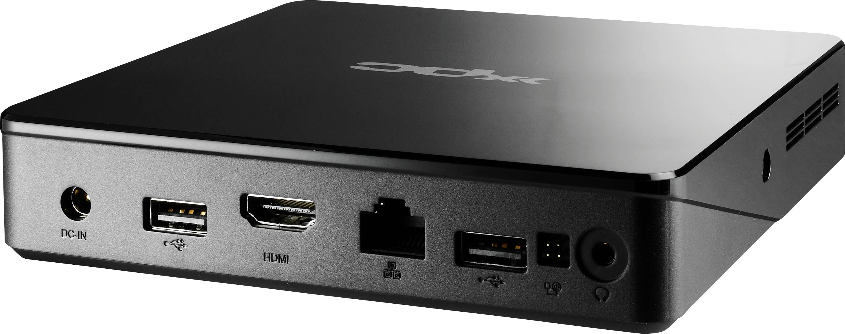 Un mini PC nero con porte: alimentazione, due USB, HDMI, Ethernet e jack per cuffie sul retro.