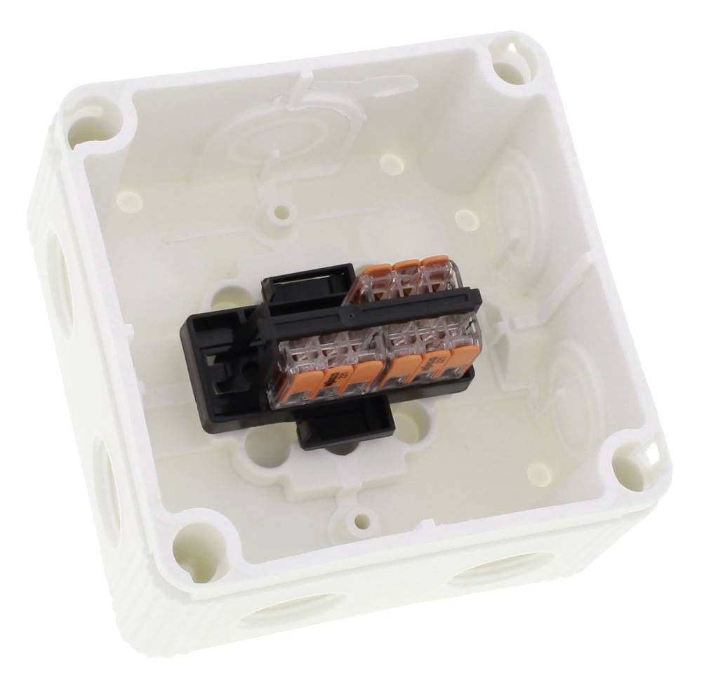 Contenitore di plastica bianco con morsettiera integrata al centro, idoneo per installazioni elettriche.